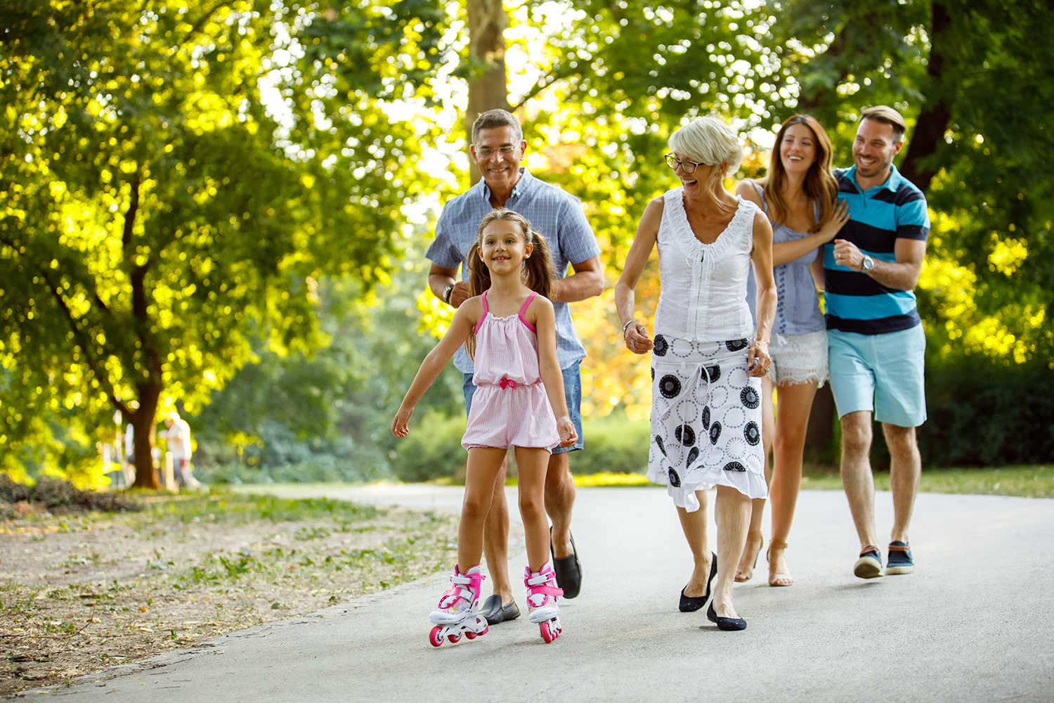 Family enjoying a walk together in the park